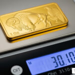 how many grams in an ounce of gold